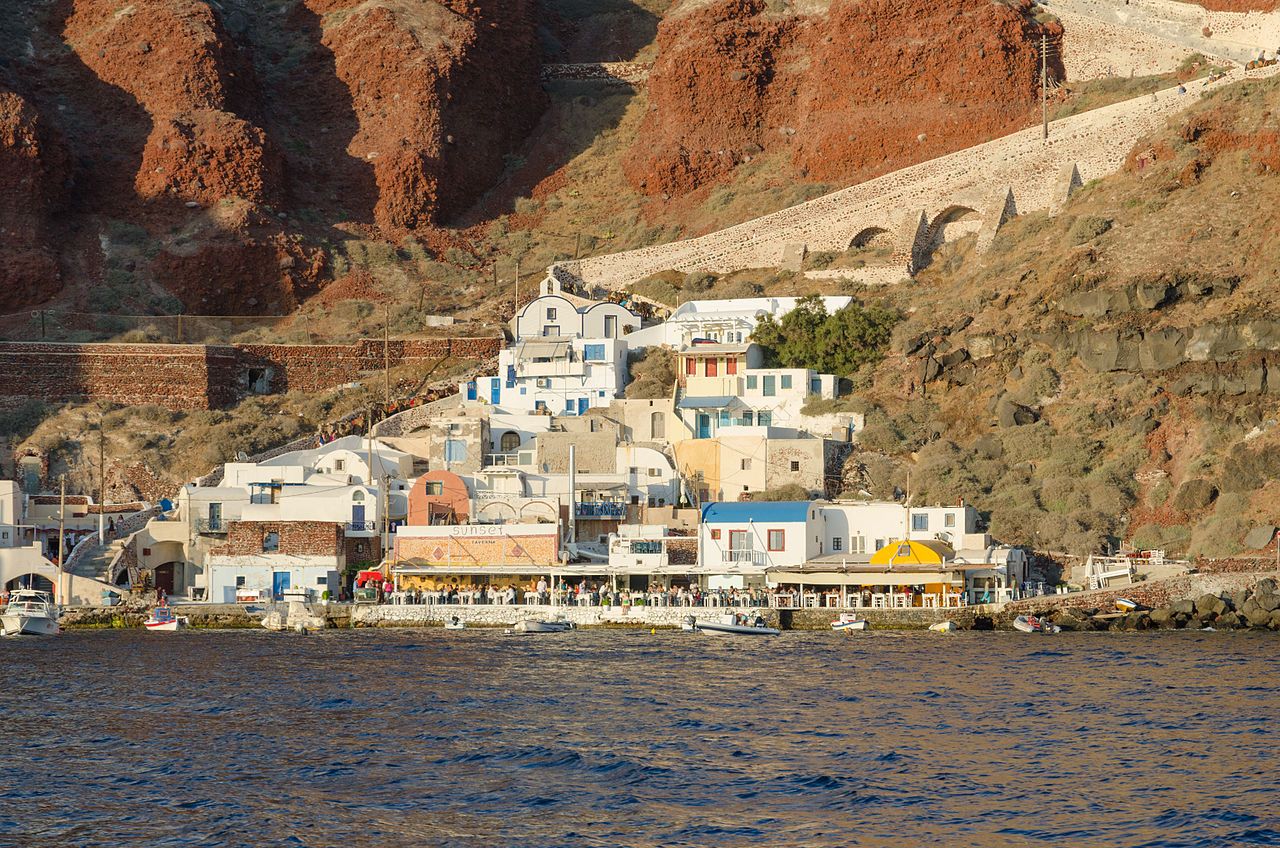 Ammoudi harbour, Oia seen from a boat in the caldera, Santorini, Greece.
