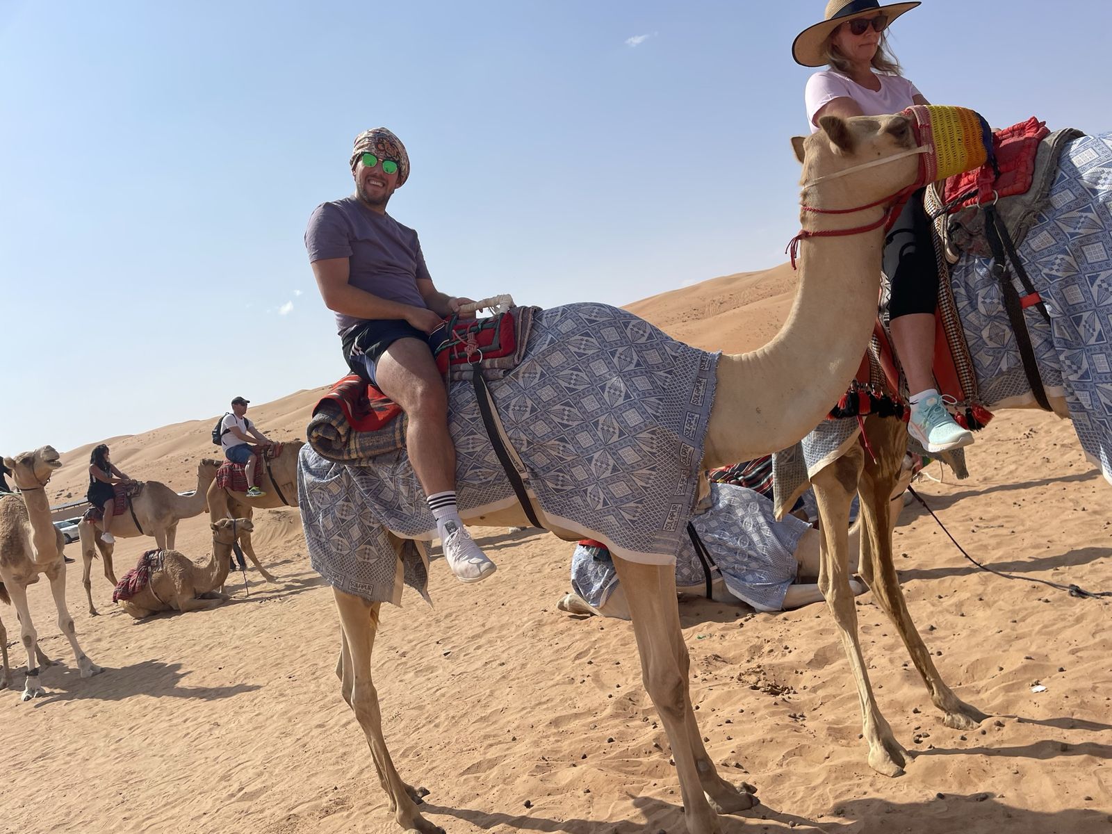 A camel ride in the Wahiba Sands, photographed by Si and Beth