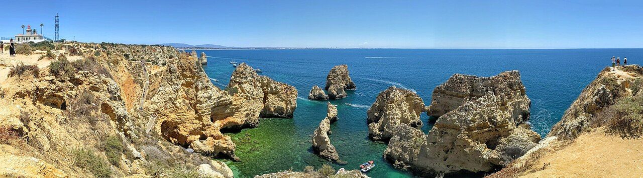 Ponta da Piadade panoramic view, with the Ponta da Piedade Lighthouse at the left