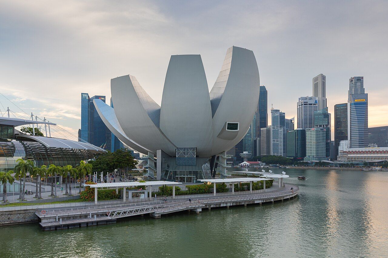 ArtScience Museum, Marina Bay Sands, in the late afternoon, in front of the skyline of the Central Business District, Si