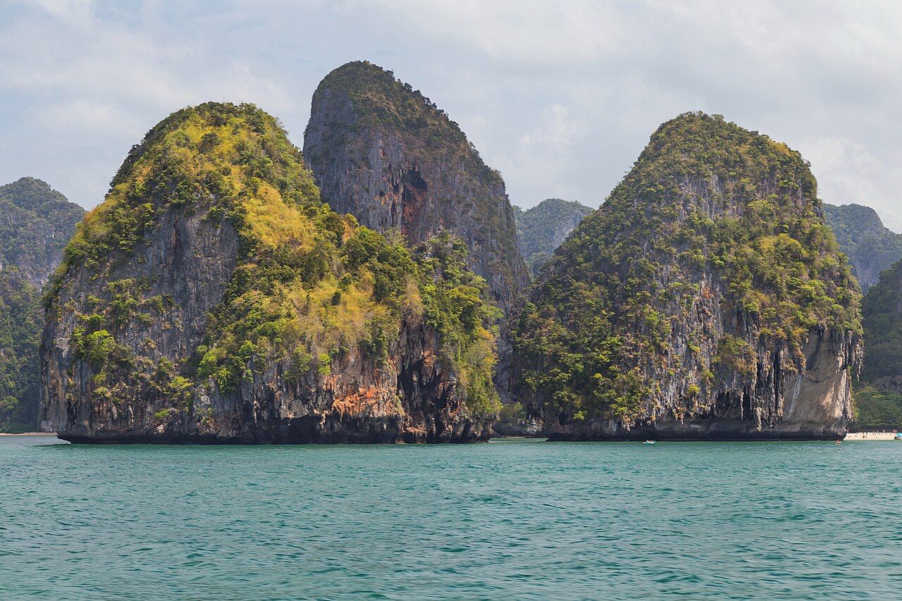 Karst rocks. Views from the ship sailing on the route Ao Nang - Ko Lanta Yai. Krabi Province, Thailand.