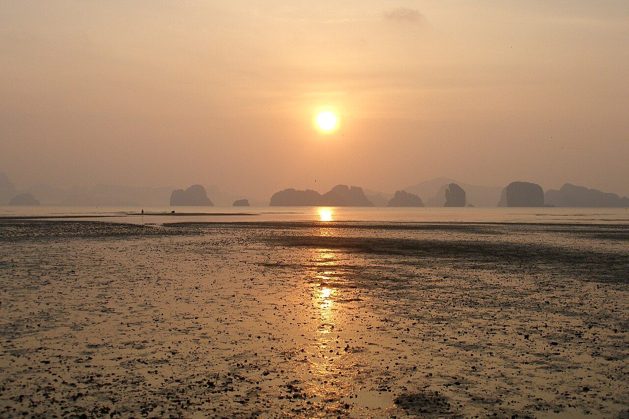 Dreamy ethereal sunrise on the shores of tropical Koh Yao Noi island. The islands of Krabi and Phang Nga Bay were formed