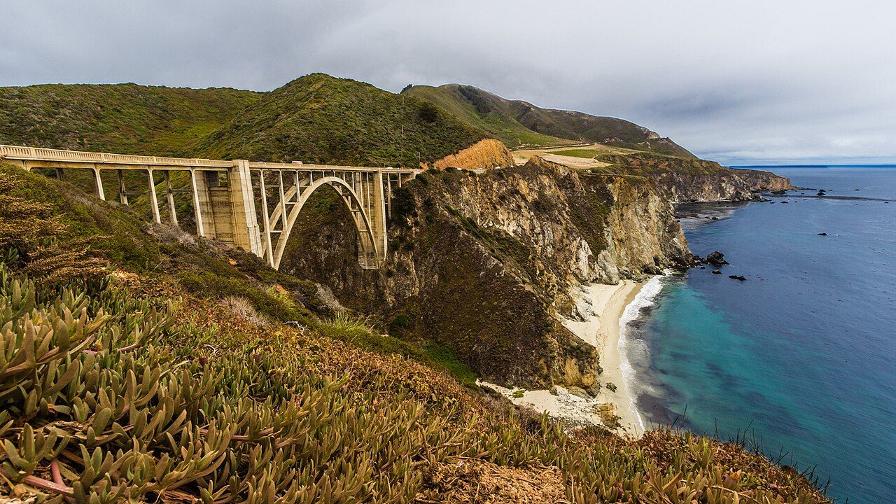 500px provided description: The famous Bixby bridge along the coast of California. [#Landscapes ,#Sunset ,#Ocean ,#Calif